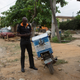 An employee of online retailer Jumia, makes a delivery by motorcycle in Lagos